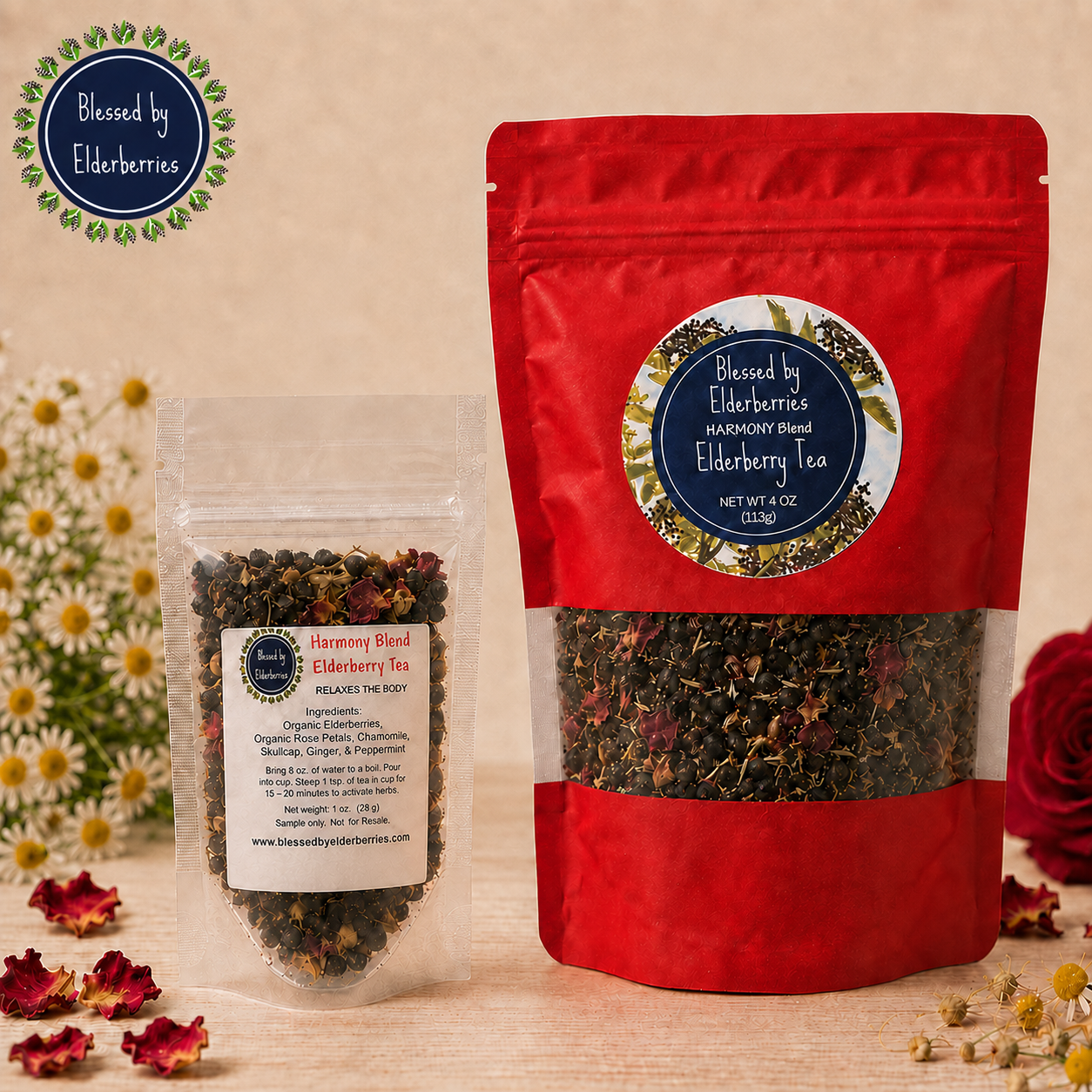 One ounce and four ounce Harmony Blend Elderberry Tea bags displayed with chamomile, red rose petals, and the Blessed by Elderberries logo.
