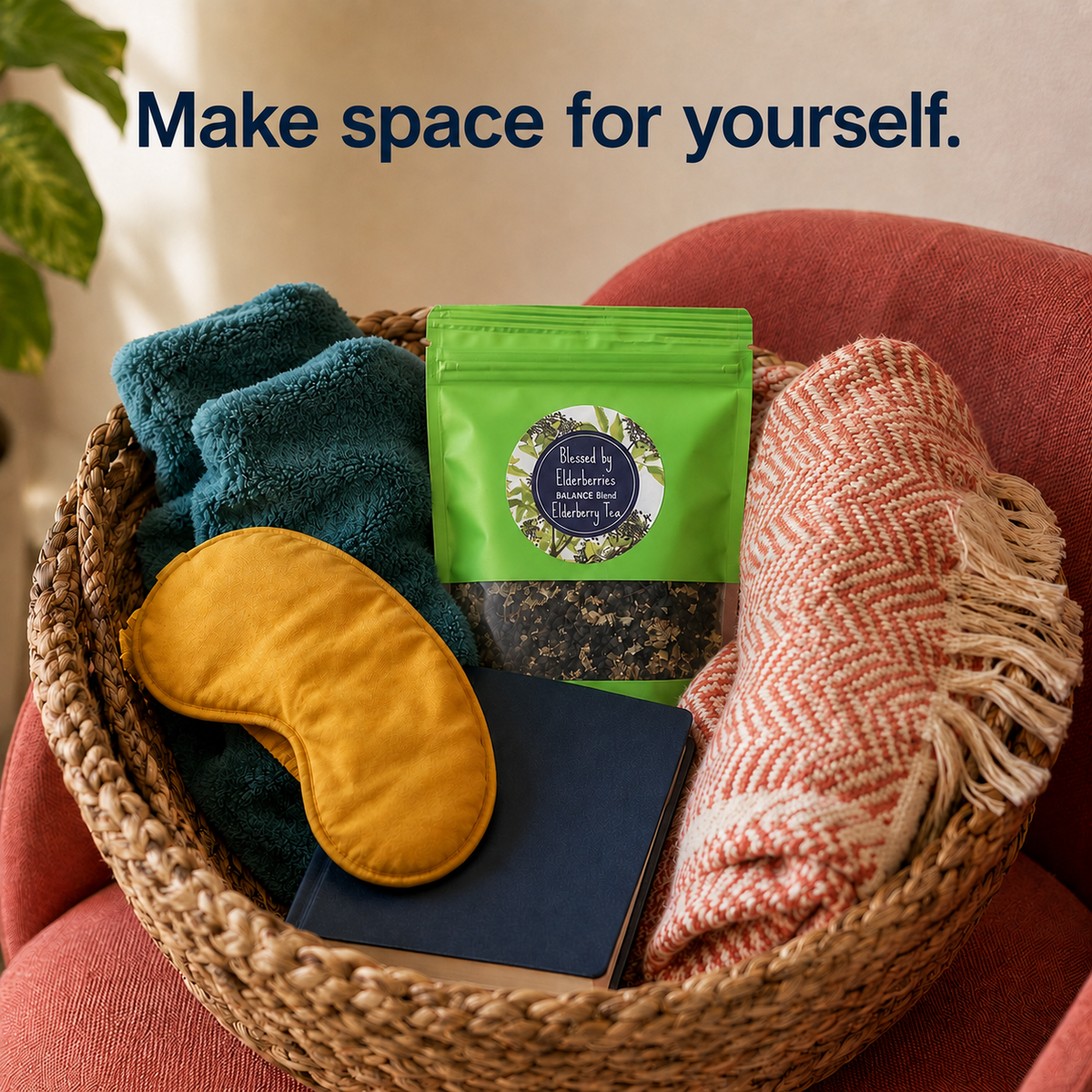Monthly self-care basket with Balance Blend tea, a soft blanket, sleep mask, journal, and colorful pillows