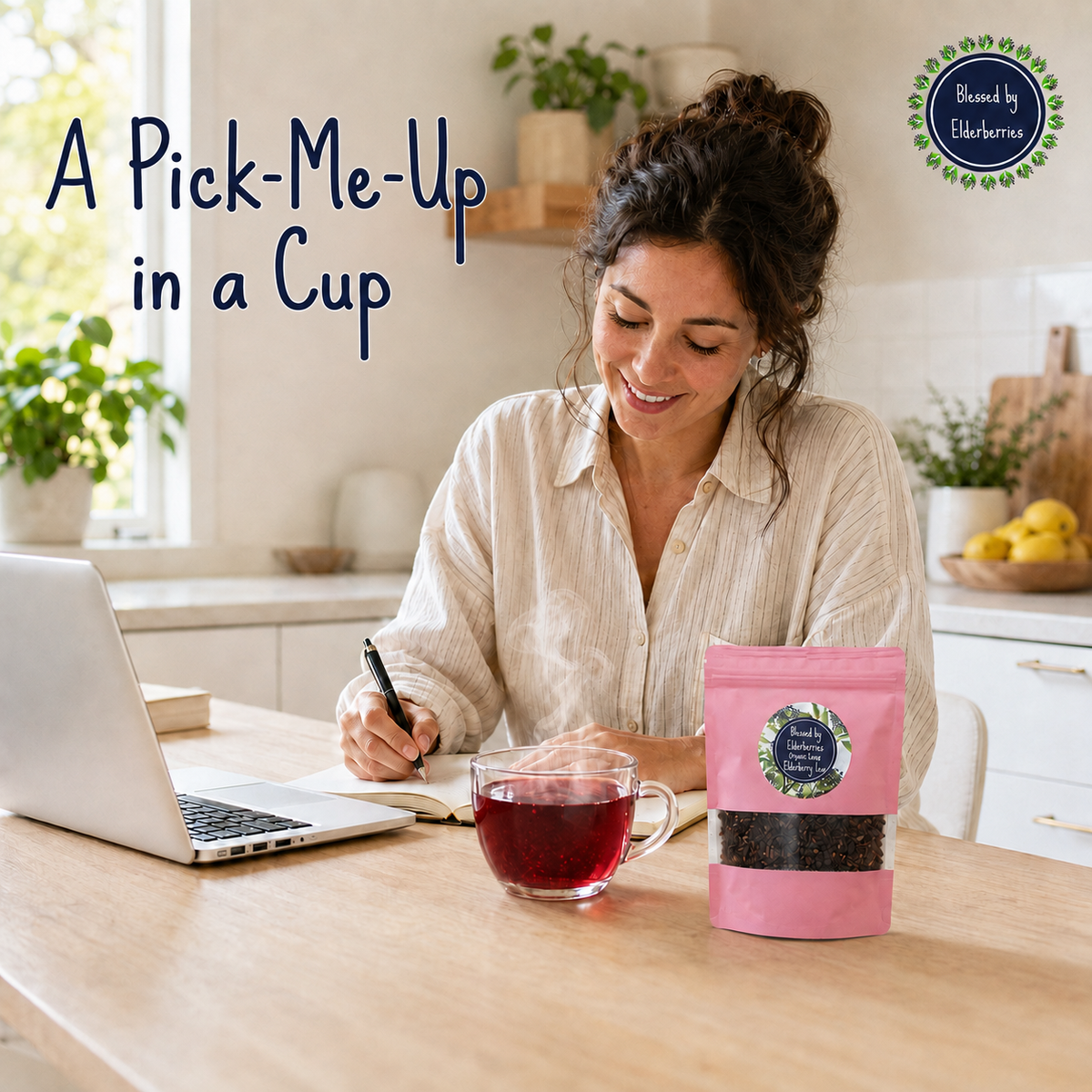 Woman working beside Power Blend Elderberry Tea and a clear glass cup filled with ruby-red power blend elderberry tea, with the words “A Pick-Me-Up in a Cup”