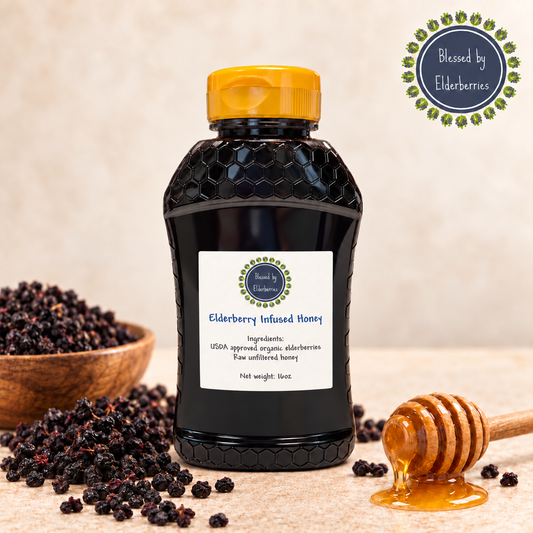 16 oz Elderberry-Infused Raw Honey bottle with dried elderberries and a honey dipper