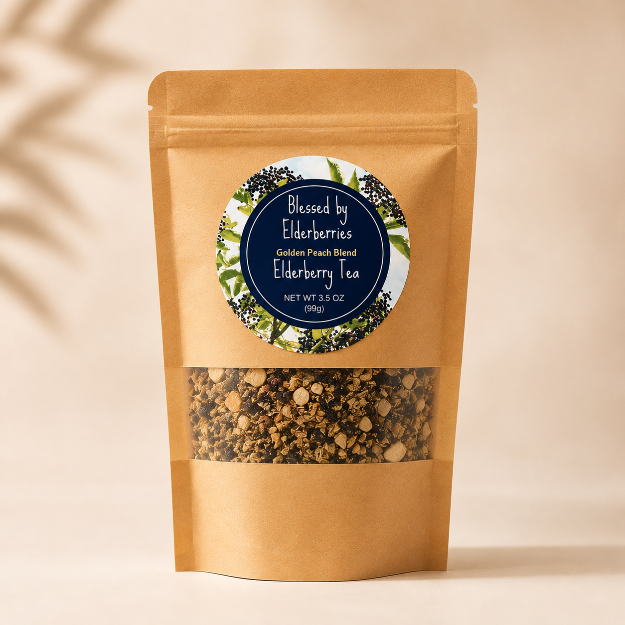 Golden Peach Elderberry Herbal Tea in a 3.5 oz kraft bag with visible loose leaf tea, by Blessed by Elderberries.
